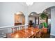 Spacious dining room featuring a large wooden table and elegant decor at 2511 Hope Dr, Conyers, GA 30094