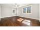 Well-lit bedroom with hardwood floors and large windows at 1005 W Kingston Dr, Atlanta, GA 30342