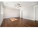 Bright bedroom with hardwood floors and natural light at 1005 W Kingston Dr, Atlanta, GA 30342