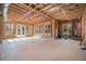 Spacious unfinished room with ample natural light, offering endless possibilities for customization and expansion at 1005 W Kingston Dr, Atlanta, GA 30342