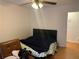 Modest bedroom featuring neutral walls, ceiling fan, and minimal furnishings at 330 Warm Springs Cir, Roswell, GA 30075