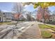 Scenic street view with colorful fall foliage and sidewalks in a beautiful neighborhood at 330 Warm Springs Cir, Roswell, GA 30075