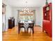 Bright dining room featuring modern lighting and a view of the backyard at 1485 Camelot Ln, Tucker, GA 30084