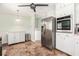 Functional kitchen featuring stainless steel appliances and ample cabinet space at 1485 Camelot Ln, Tucker, GA 30084