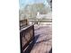 View of the wood deck with built in bench seating and wooden railings overlooking the back yard at 2031 Lakewood Cir, Grayson, GA 30017