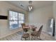 Well-lit dining room featuring modern decor and a pleasant view through the window at 2157 Staunton Dr, Duluth, GA 30096