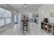 Kitchen with island and stainless steel appliances and white wood patterned flooring at 2157 Staunton Dr, Duluth, GA 30096