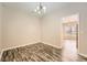 Bright dining area with hardwood floors offers a cozy space for Gathering dinners and entertaining at 2985 Pilgrim Mill Rd, Cumming, GA 30041