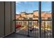 Balcony view showing brick apartment buildings and parking lot at 1199 Huff Nw Rd # 109, Atlanta, GA 30318