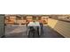 Relaxing rooftop deck with dining table and seating, perfect for entertaining and enjoying the view at 1199 Huff Nw Rd # 109, Atlanta, GA 30318