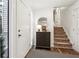 Inviting foyer with natural light and a view of the staircase leading to the upper level at 122 Dials Dr, Woodstock, GA 30188