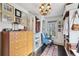 Well-organized walk-in closet with built-in shelving and a vintage chandelier at 1241 Briarcliff Rd, Atlanta, GA 30306