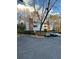 Well-maintained complex features bright, multi-level buildings with brick accents and ample parking at 1376 Keys Lake Ne Dr, Brookhaven, GA 30319
