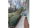 Exterior view of landscaped yard and home entrance at 1376 Keys Lake Ne Dr, Brookhaven, GA 30319