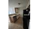 Functional kitchen features tile flooring, a complete appliance package, and good cabinet storage at 1376 Keys Lake Ne Dr, Brookhaven, GA 30319