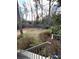 Well-maintained landscaped lawn with trees in the background at 1376 Keys Lake Ne Dr, Brookhaven, GA 30319