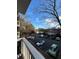 View of a parking lot with many parked cars surrounded by trees and other buildings at 1376 Keys Lake Ne Dr, Brookhaven, GA 30319