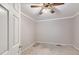 Bedroom with a ceiling fan and neutral walls showcases ample natural light at 8640 Embrey Dr, Jonesboro, GA 30236