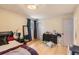 Bedroom with wood floors, dresser, and bed at 8640 Embrey Dr, Jonesboro, GA 30236