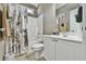 Cozy bathroom with white vanity, stylish shower curtain, and modern fixtures at 2837 Captain Ct, Dacula, GA 30019