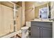 Well-lit bathroom showcasing a glass-door shower, updated vanity, and modern fixtures at 2837 Captain Ct, Dacula, GA 30019