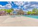 A large community pool with a covered picnic area and clear blue skies creates a resort-style atmosphere at 2837 Captain Ct, Dacula, GA 30019