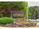 The community entrance sign is adorned with stone pillars and flower beds at Daniel Park at 2837 Captain Ct, Dacula, GA 30019