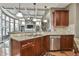 Spacious kitchen with granite countertops and adjacent living room at 2837 Captain Ct, Dacula, GA 30019