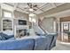 Cozy living room with fireplace, built-in shelving, and staircase access at 2837 Captain Ct, Dacula, GA 30019