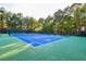 Beautiful tennis courts with green and blue surfacing and lighting at 2837 Captain Ct, Dacula, GA 30019