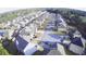 Aerial view of a neighborhood with neat streets and many houses at 3309 Gardenside Walk, Loganville, GA 30052