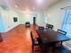 Spacious game room with pool table, laminate flooring, and large windows at 3309 Gardenside Walk, Loganville, GA 30052