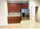 Open kitchen with stainless steel appliances and granite countertops at 3309 Gardenside Walk, Loganville, GA 30052