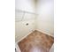 The laundry room includes connections for a washer and dryer and plenty of storage at 3309 Gardenside Walk, Loganville, GA 30052