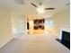 Open concept living space seamlessly connects the living room, kitchen, and dining area for easy entertaining at 3309 Gardenside Walk, Loganville, GA 30052