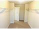 Walk-in closet with ample shelving and storage space at 3309 Gardenside Walk, Loganville, GA 30052