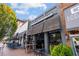 Exterior view of Currahee Brewing Co featuring outdoor seating, and a modern facade at 5170 Deerlake Dr, Alpharetta, GA 30005