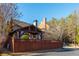 Private backyard featuring a charming gazebo and a well-maintained wooden fence for added privacy at 1399 Legrand Cir, Lawrenceville, GA 30043