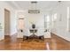 Formal dining room featuring hardwood floors and a modern chandelier at 1399 Legrand Cir, Lawrenceville, GA 30043