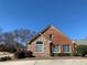 Attractive brick and stone home featuring a combination of brick and stone materials at 1404 Haven Cir, Douglasville, GA 30135