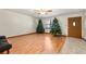 Cozy living room showcasing wood floors, a ceiling fan and natural light at 1465 Rockbridge Rd, Stone Mountain, GA 30087