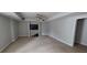 Finished basement with neutral walls, carpet flooring, and a ceiling fan providing an open versatile space for various activities at 3302 Fieldwood Se Dr, Smyrna, GA 30080