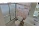 This bathroom has a shower with patterned wallpaper, tile floor and vanity at 3302 Fieldwood Se Dr, Smyrna, GA 30080