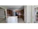 Well-equipped kitchen with dark wood cabinets, tile backsplash, and stainless steel appliances at 3302 Fieldwood Se Dr, Smyrna, GA 30080