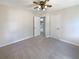 Bedroom featuring carpeted floors, natural light and neutral walls at 4227 Pine Cir, Forest Park, GA 30297