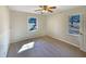 Bedroom featuring neutral walls, carpeted floor, and natural light at 4227 Pine Cir, Forest Park, GA 30297