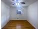 Bedroom boasts hardwood floors, ceiling fan, natural light, and a closet at 1376 Cornwall Rd, Decatur, GA 30032