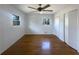 Spacious bedroom has hardwood floors, ceiling fan, natural light, and closets for storage at 1376 Cornwall Rd, Decatur, GA 30032