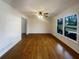 Spacious living room featuring hardwood floors and a bright window at 1376 Cornwall Rd, Decatur, GA 30032