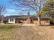 Brick house featuring a spacious backyard and brick patio, perfect for outdoor entertaining at 2622 Abington Dr, Snellville, GA 30078